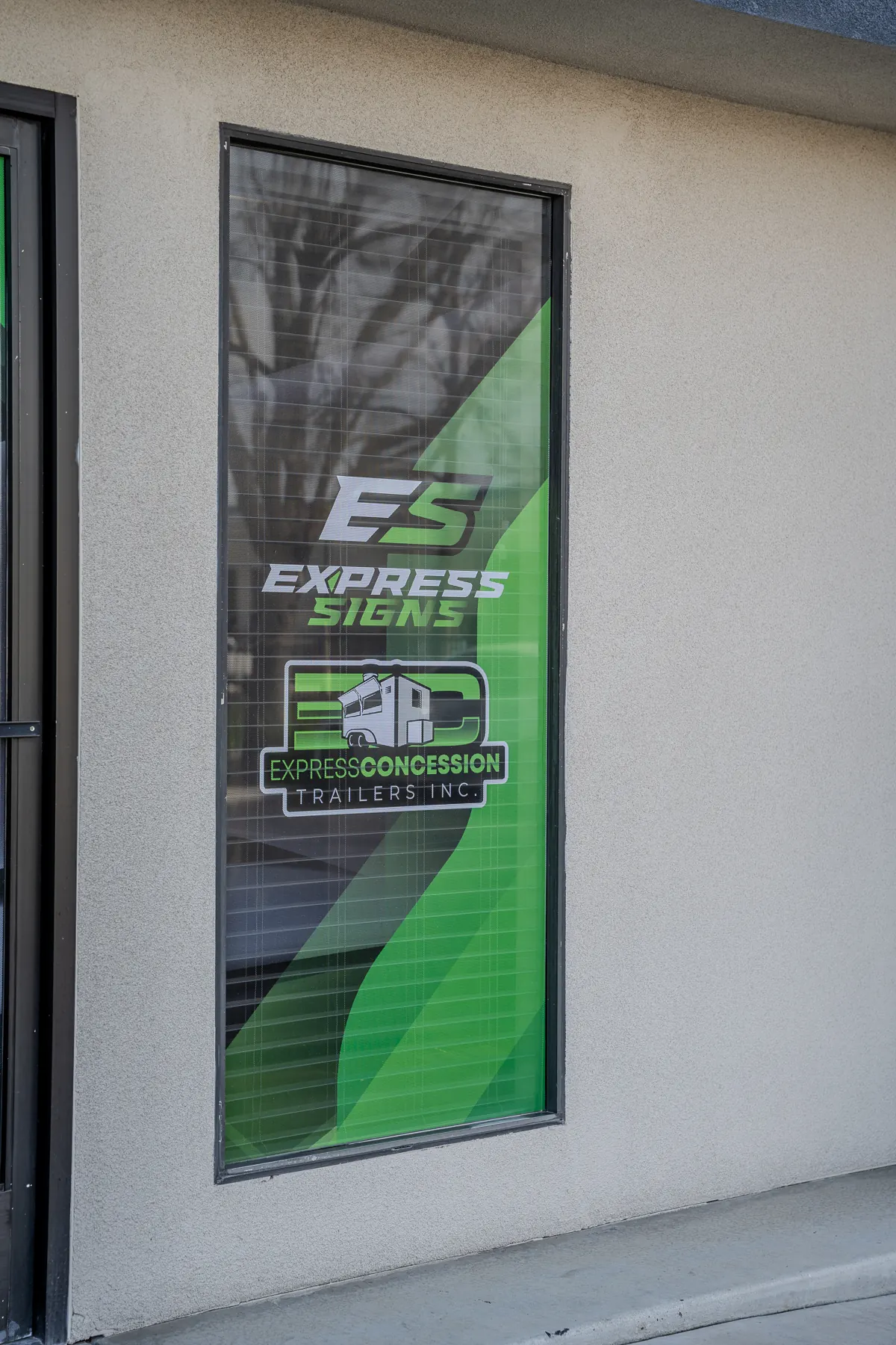 Express Signs window graphic at the Fresno shop